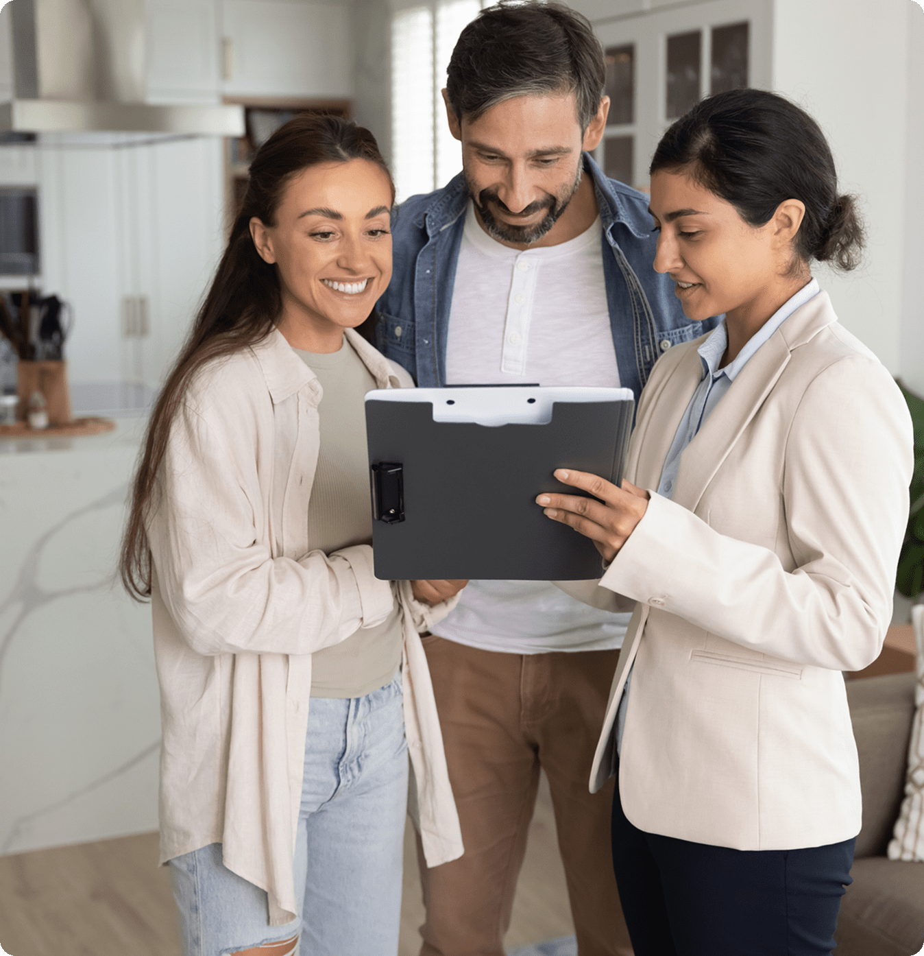 Real estate agent discussing with couple